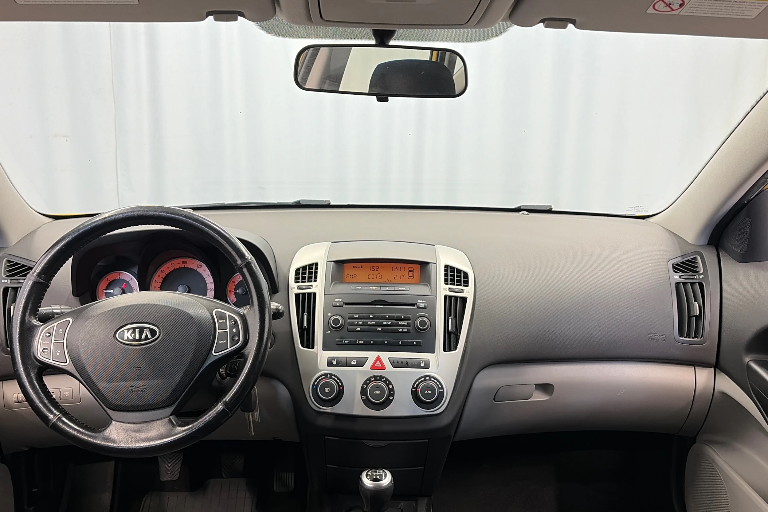 keltainen Kia Ceed 2009 kuva 19.