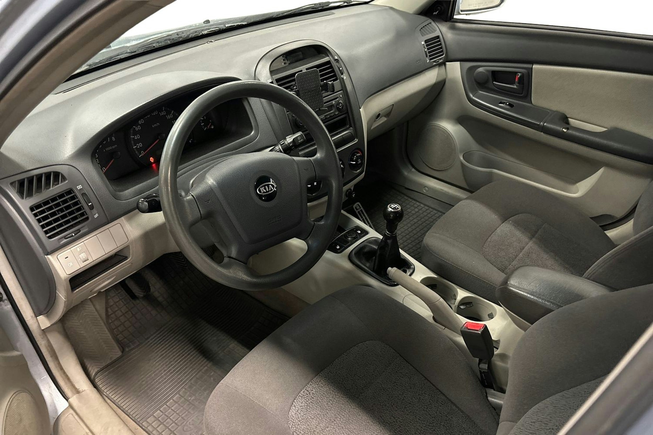 sininen Kia Cerato 2006 kuva 6.