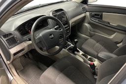 sininen Kia Cerato 2006 kuva 6.