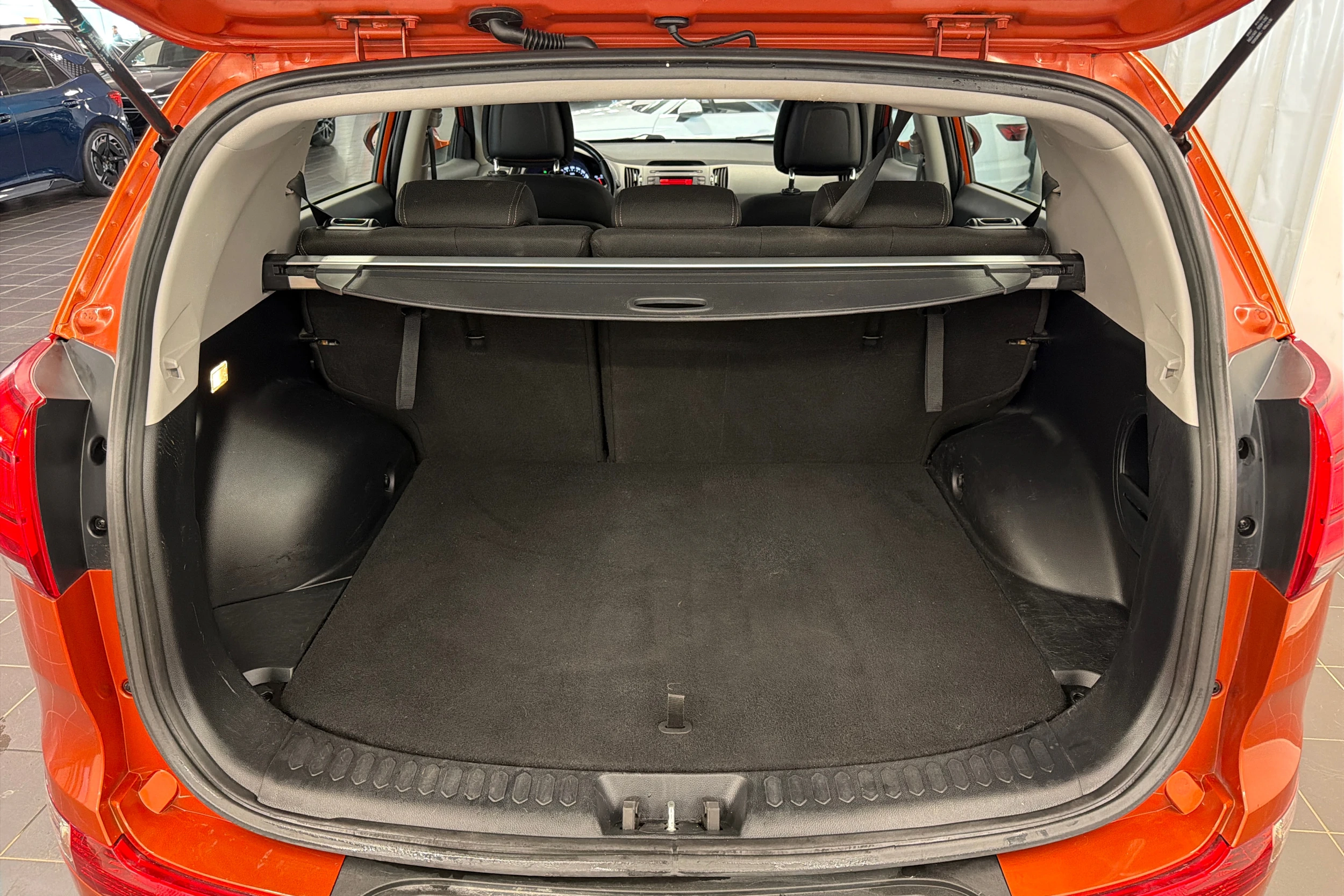 oranssi Kia Sportage 2014 kuva 11.