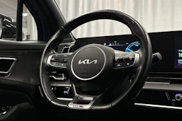 sininen Kia Sportage 2023 kuva 18.