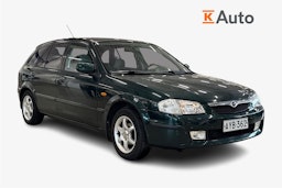 vihreä Mazda 323 1999 kuva 1.