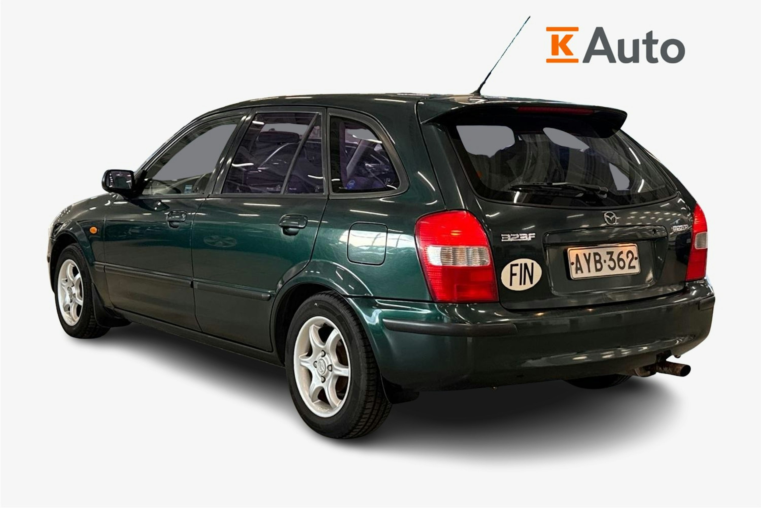 vihreä Mazda 323 1999 kuva 2.