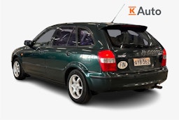 vihreä Mazda 323 1999 kuva 2.