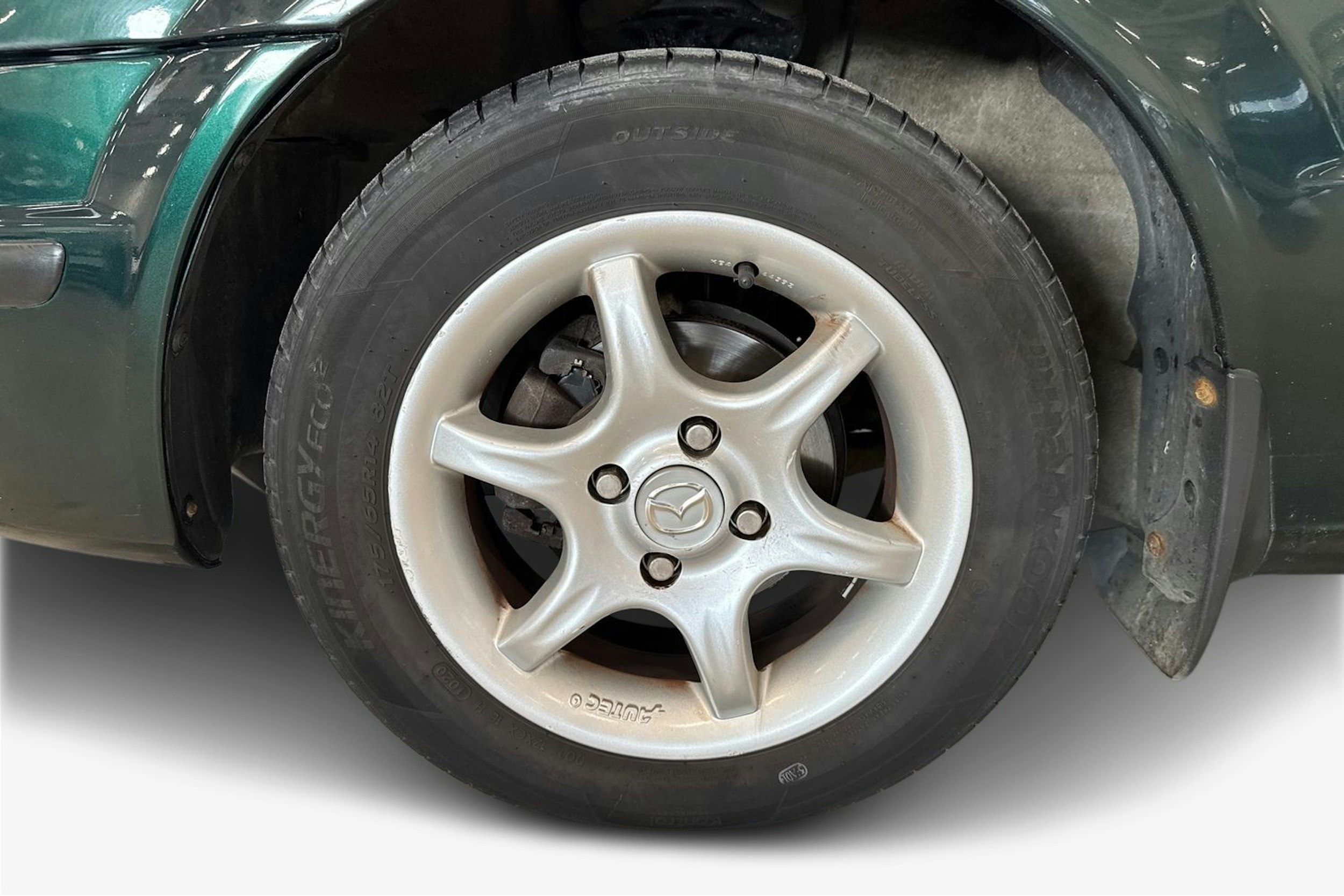 vihreä Mazda 323 1999 kuva 11.