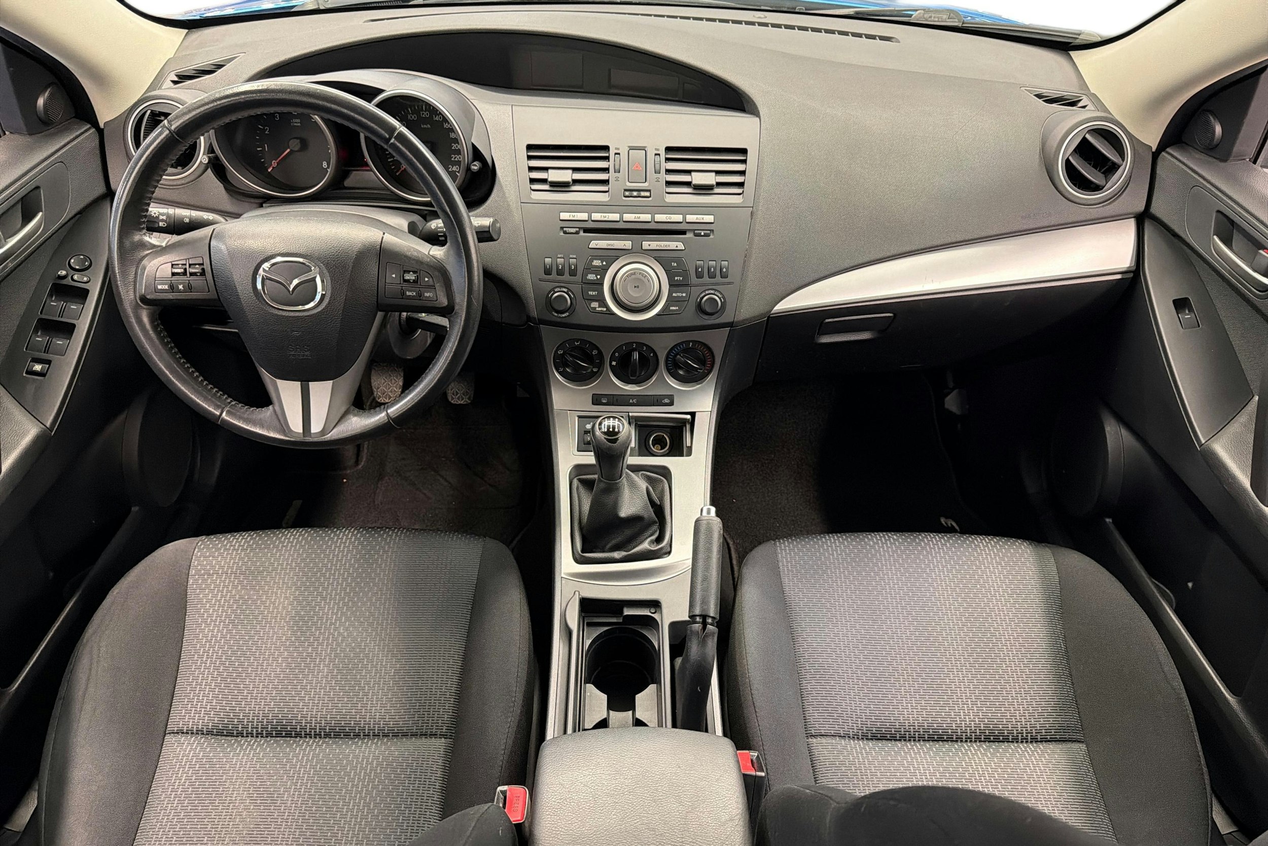 Sininen Mazda 3 2009 kuva 9.