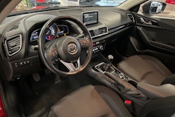 punainen Mazda 3 2014 kuva 6.