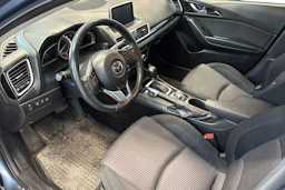 sininen Mazda 3 2015 kuva 3.