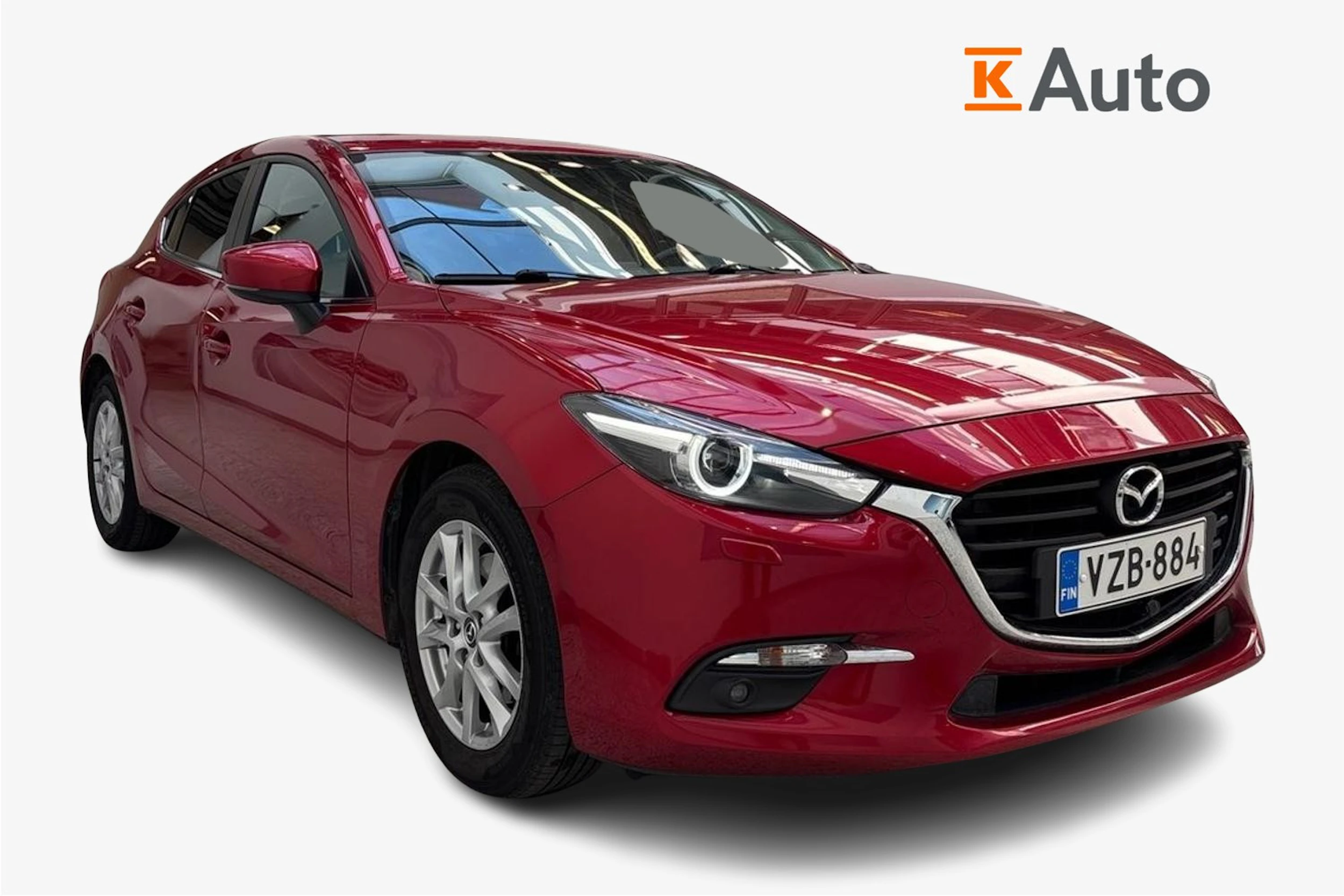 Punainen Mazda 3 2017 kuva 1.