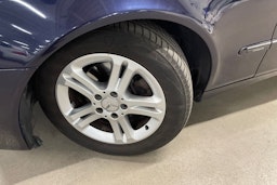 Sininen Mercedes-Benz E 2007 kuva 13.