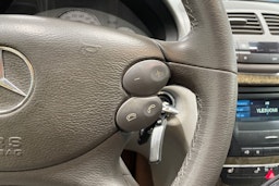 Sininen Mercedes-Benz E 2007 kuva 20.