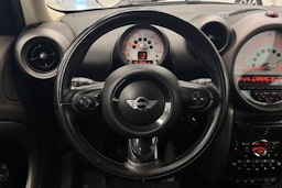 Sininen Mini Cooper D 2011 kuva 14.