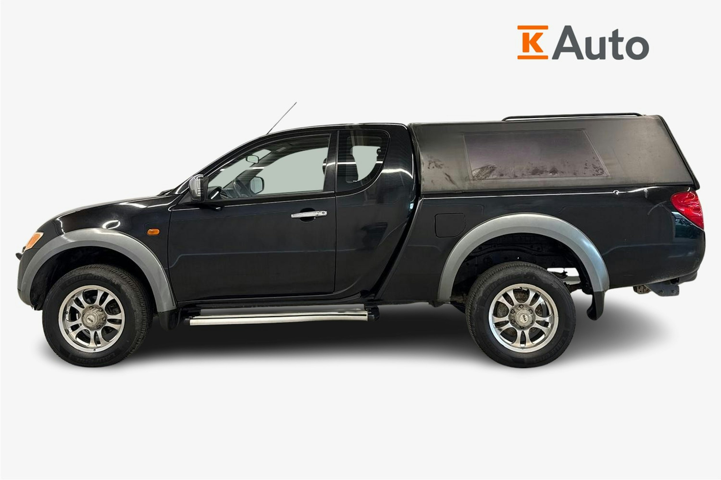 musta Mitsubishi L200 2007 kuva 6.