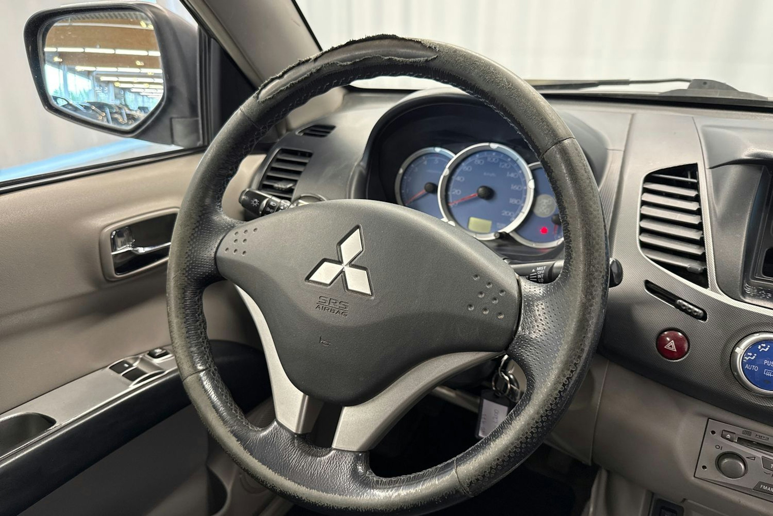 musta Mitsubishi L200 2007 kuva 13.