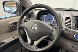 musta Mitsubishi L200 2007 kuva 13.