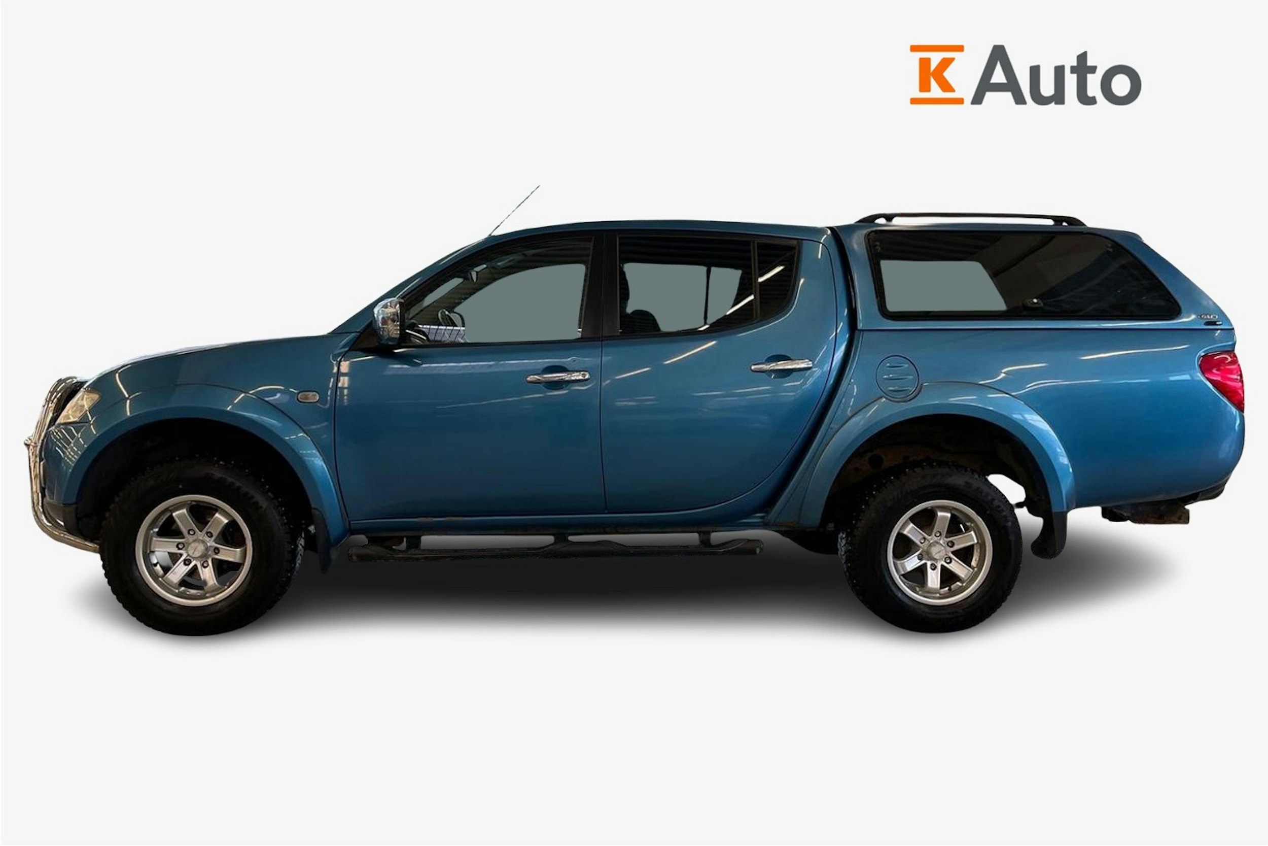 Sininen Mitsubishi L200 2011 kuva 6.