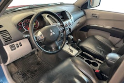 Sininen Mitsubishi L200 2011 kuva 7.
