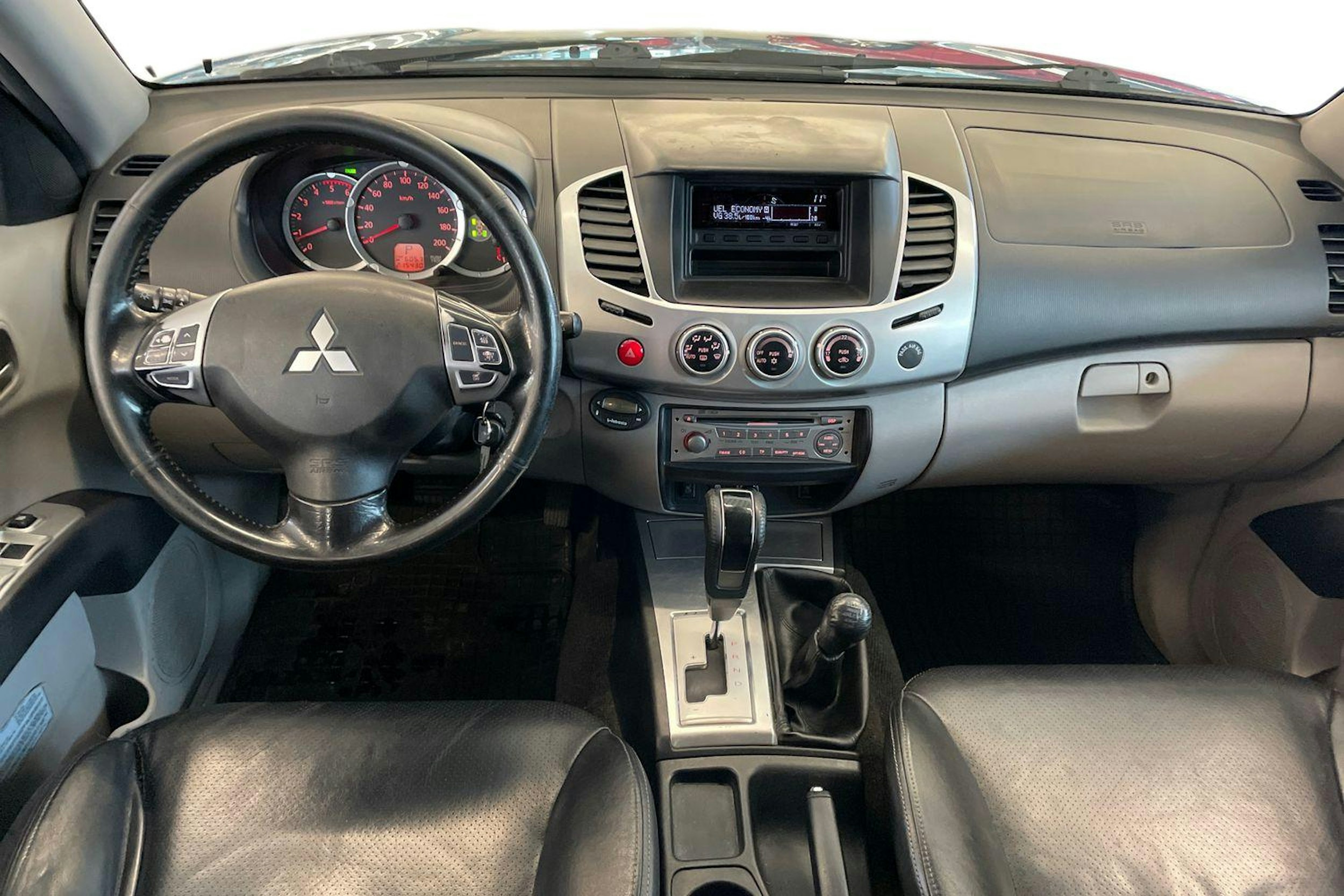 Sininen Mitsubishi L200 2011 kuva 9.