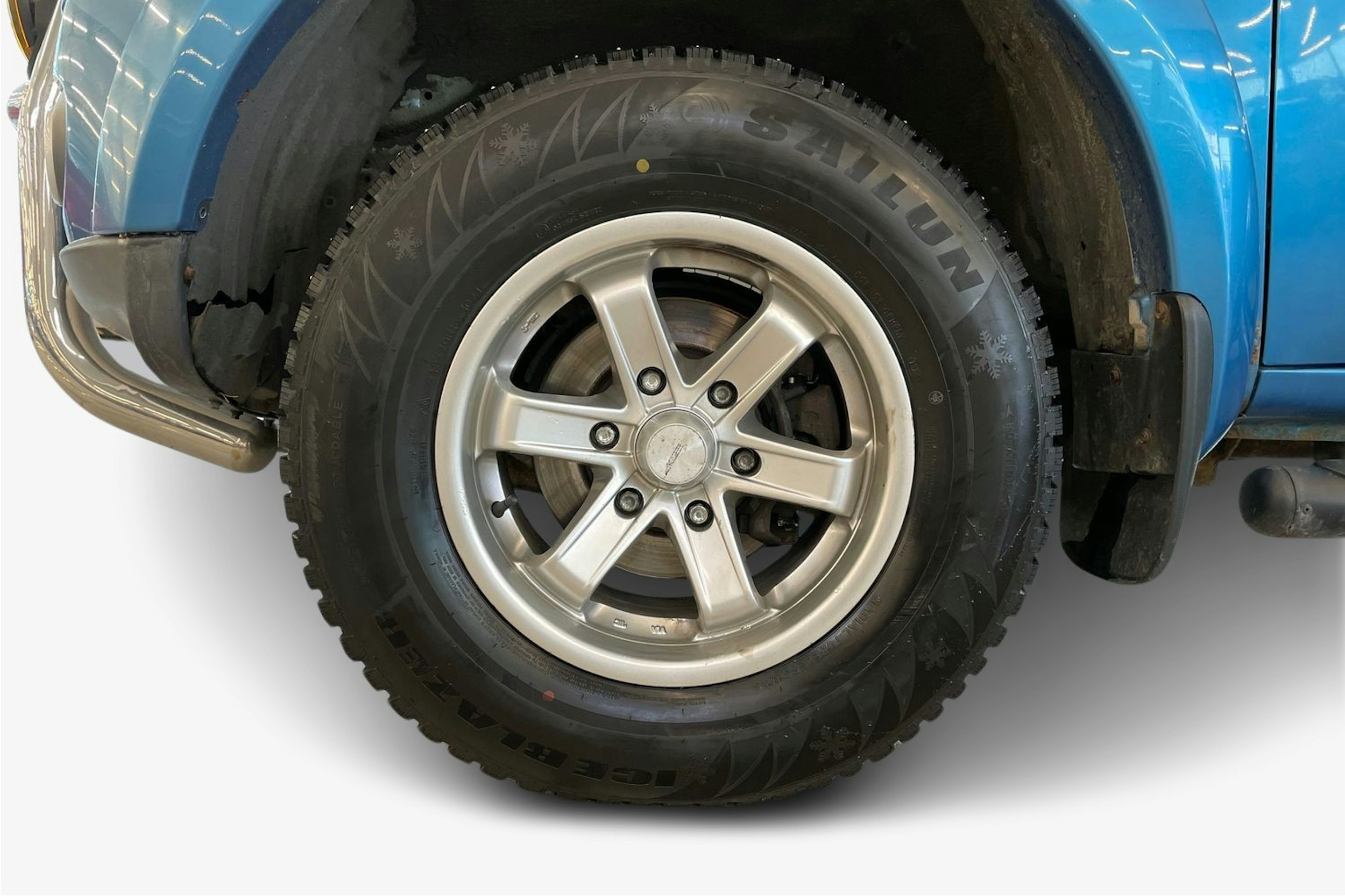 Sininen Mitsubishi L200 2011 kuva 11.