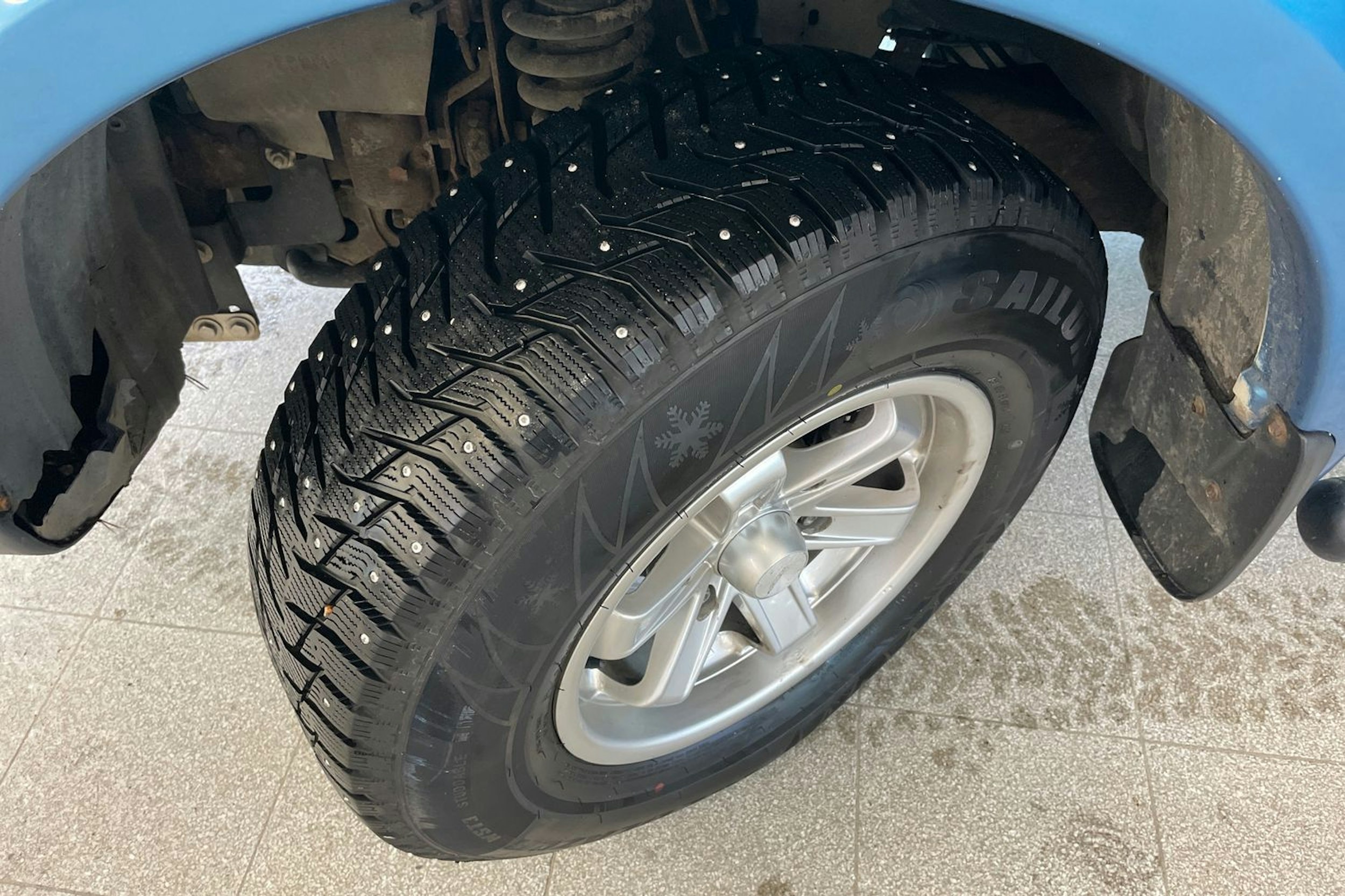 Sininen Mitsubishi L200 2011 kuva 13.