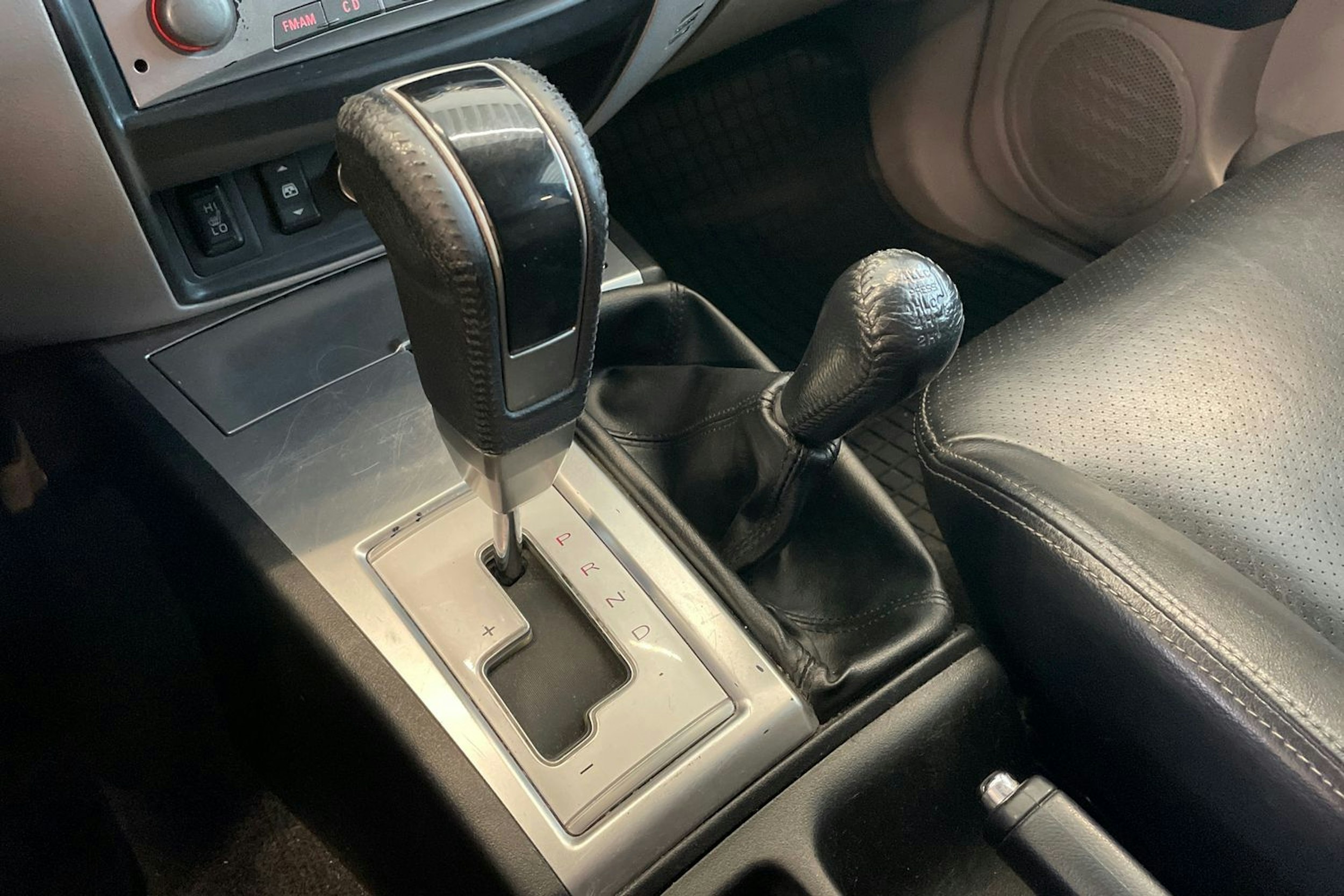 Sininen Mitsubishi L200 2011 kuva 20.