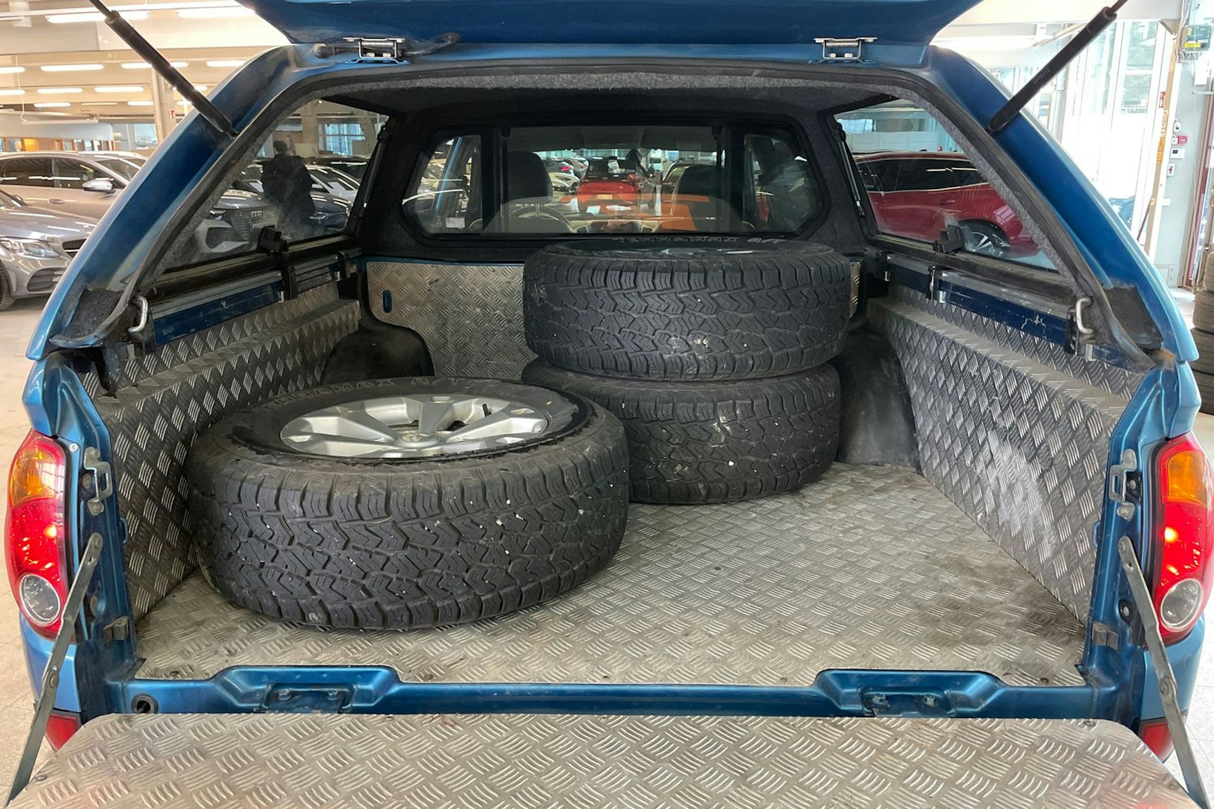 Sininen Mitsubishi L200 2011 kuva 23.