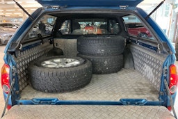 Sininen Mitsubishi L200 2011 kuva 23.