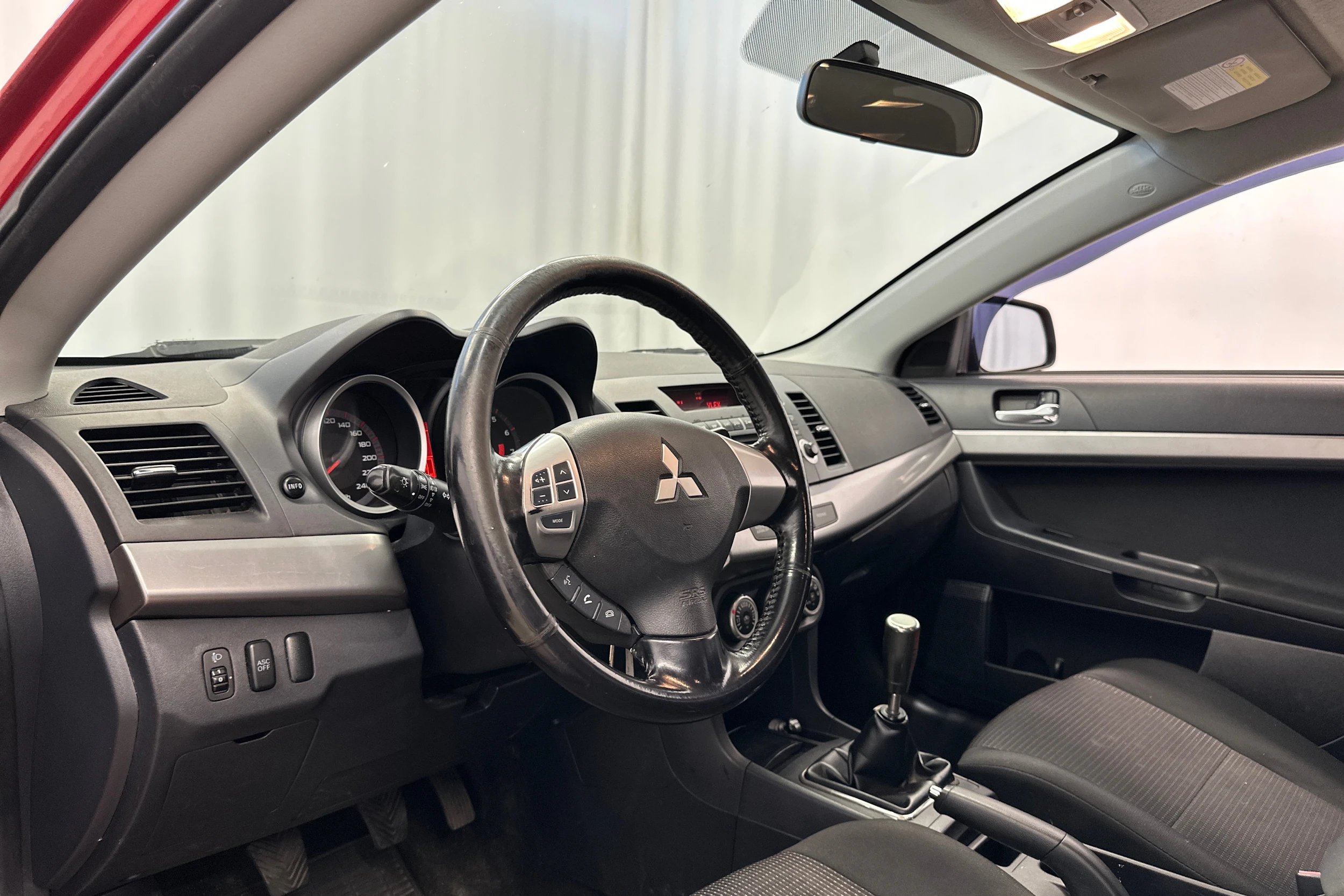 punainen Mitsubishi Lancer 2008 kuva 10.