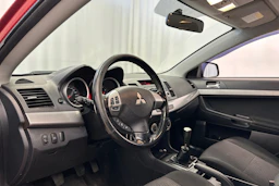 punainen Mitsubishi Lancer 2008 kuva 10.