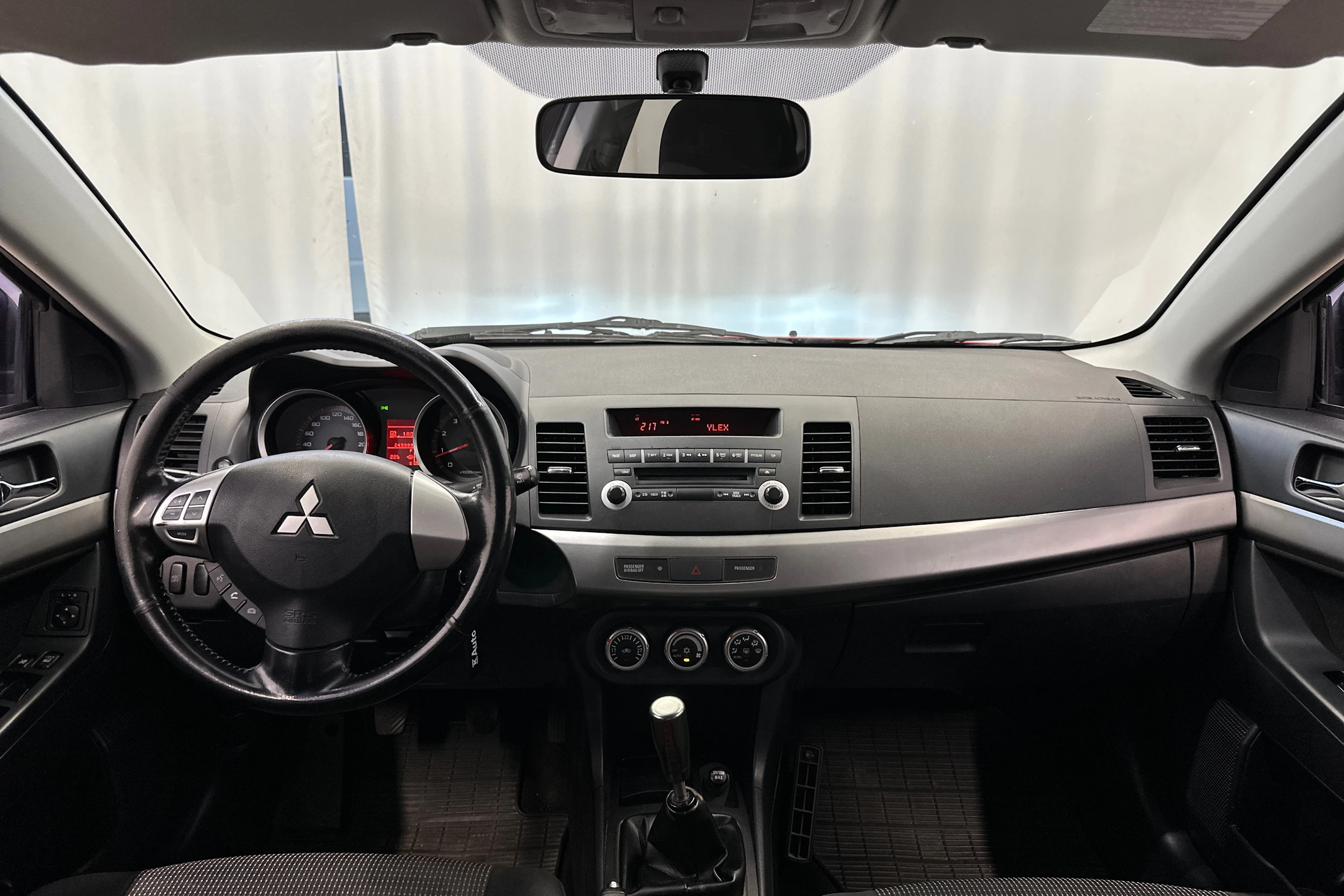 punainen Mitsubishi Lancer 2008 kuva 11.