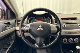 punainen Mitsubishi Lancer 2008 kuva 12.
