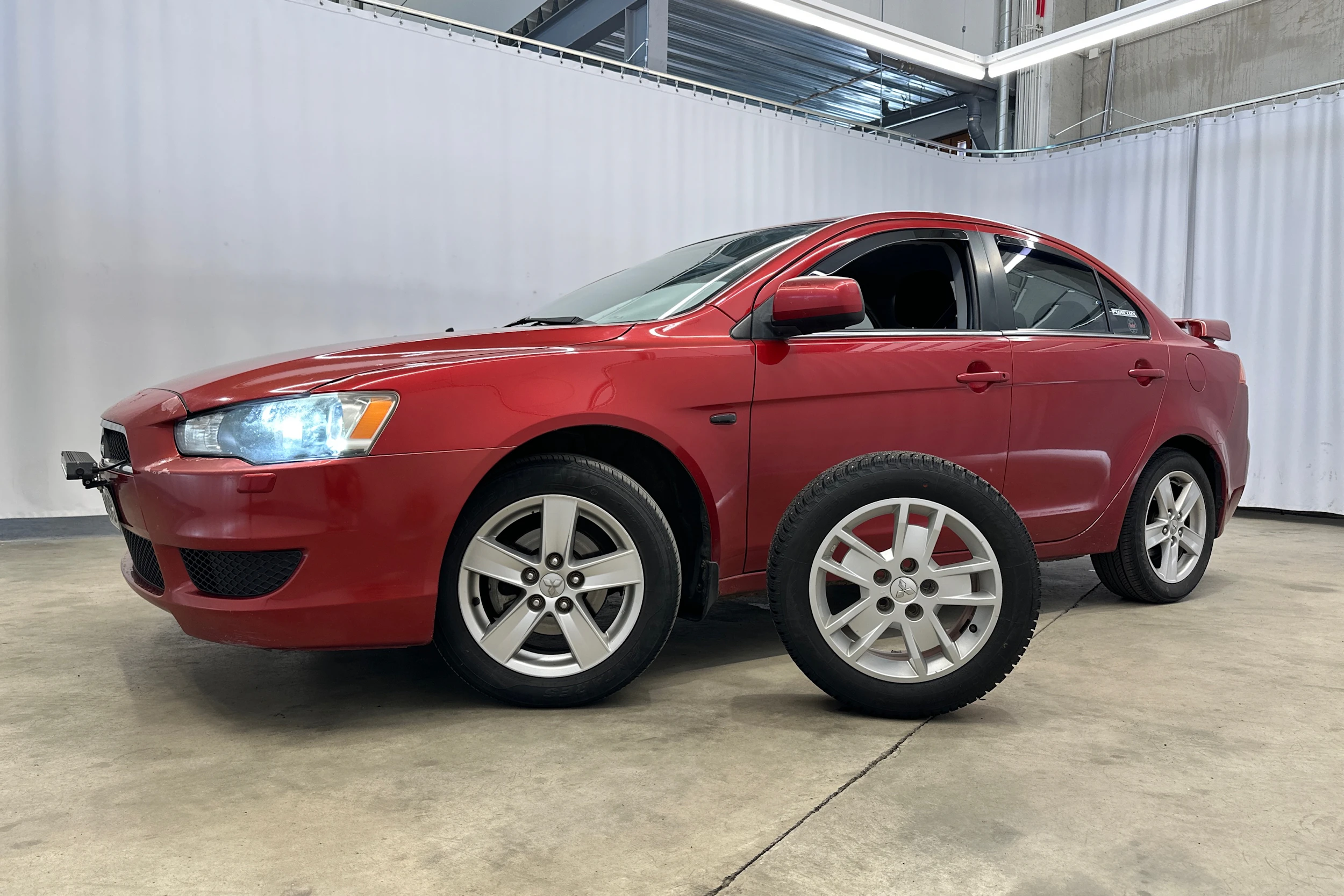 punainen Mitsubishi Lancer 2008 kuva 23.
