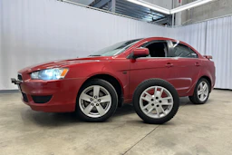 punainen Mitsubishi Lancer 2008 kuva 23.