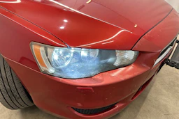 punainen Mitsubishi Lancer 2008 kuva 26.