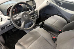 sininen Nissan Almera 2004 kuva 8.
