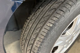 sininen Nissan Almera 2004 kuva 13.