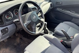 punainen Nissan Almera 2005 kuva 3.