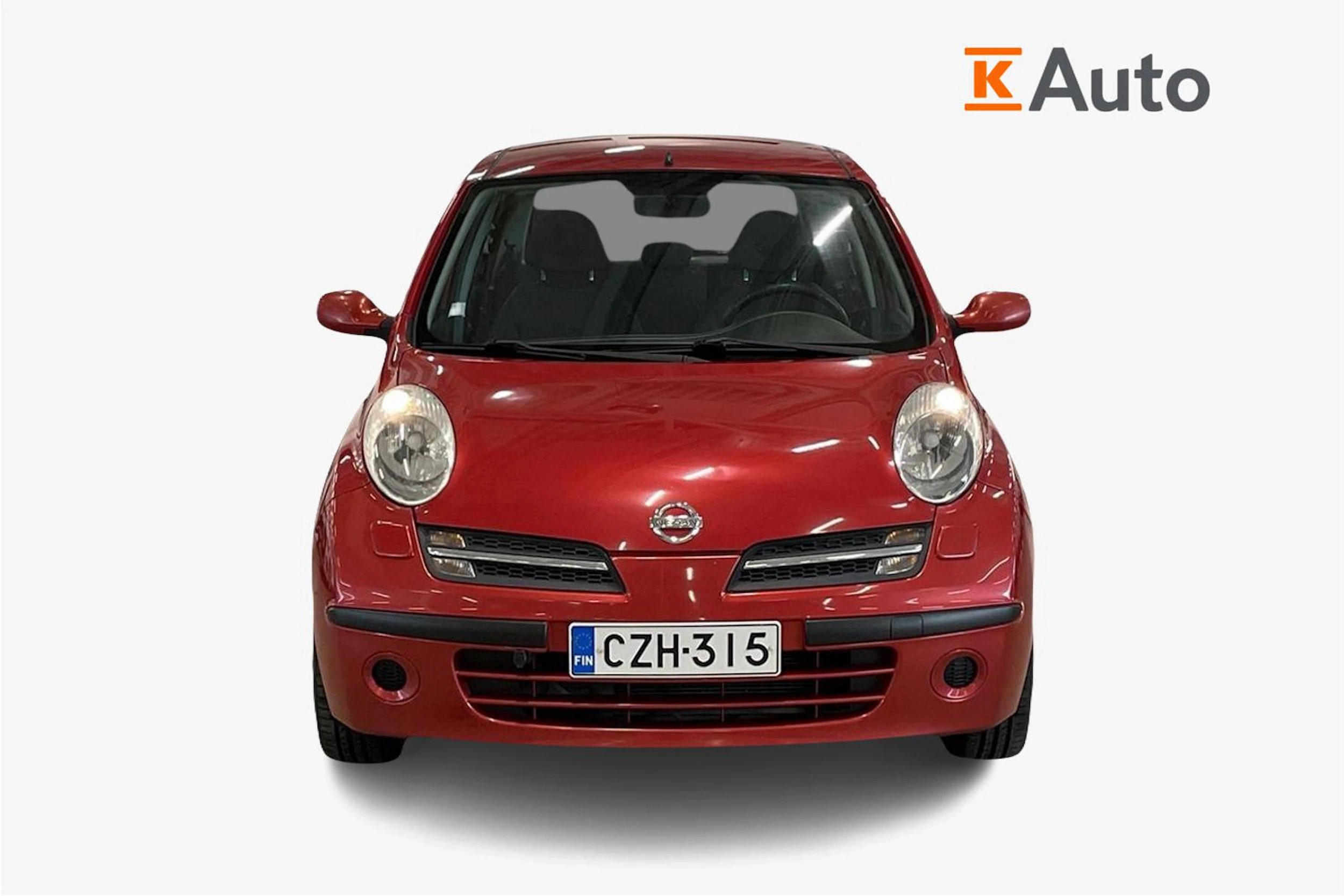 punainen Nissan Micra 2006 kuva 4.