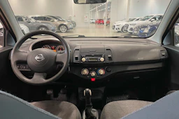 punainen Nissan Micra 2006 kuva 11.