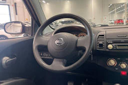 punainen Nissan Micra 2006 kuva 12.