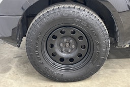 musta Nissan Navara 2009 kuva 26.