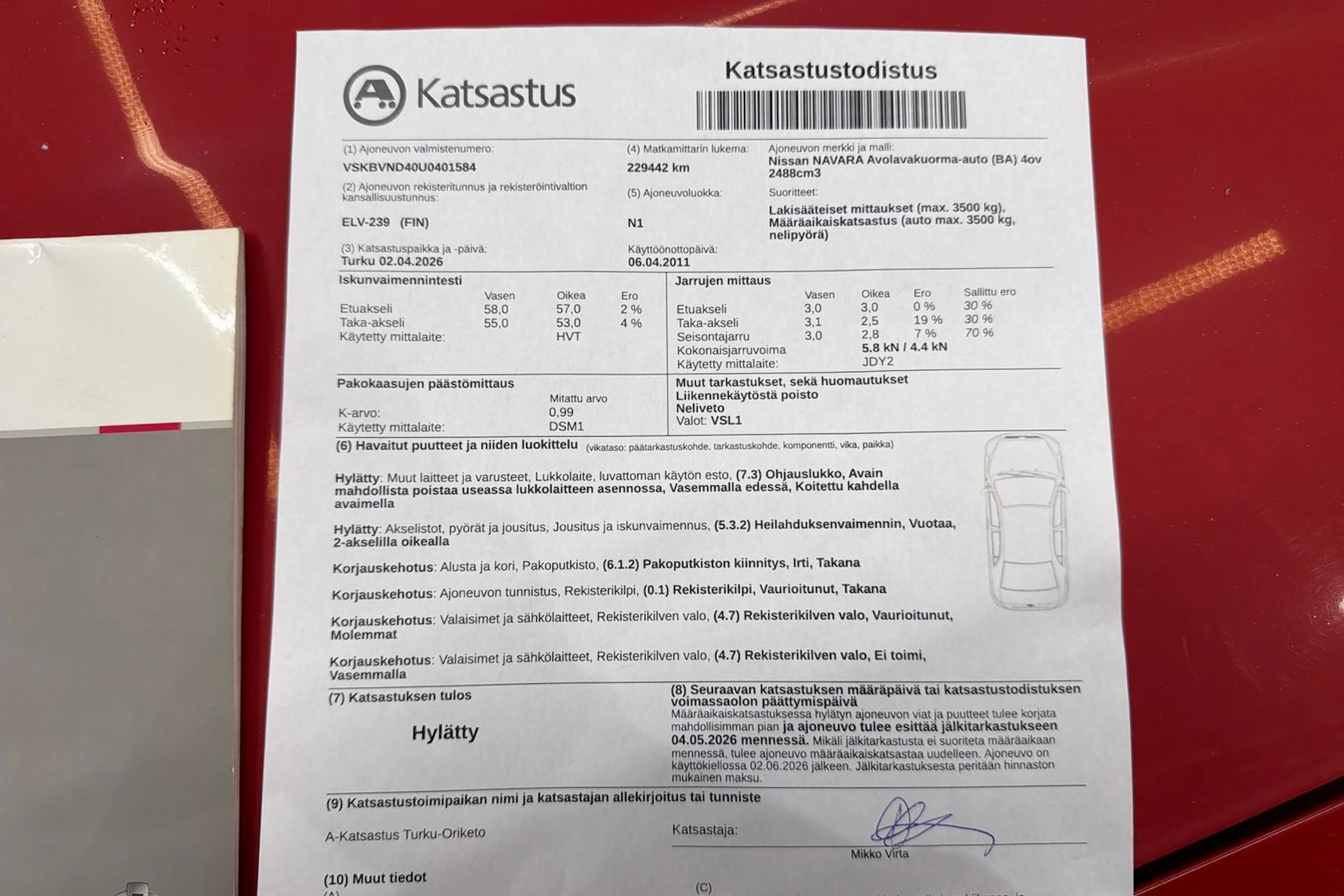 punainen Nissan Navara 2011 kuva 38.