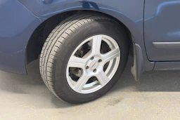 sininen Nissan Note 2006 kuva 13.