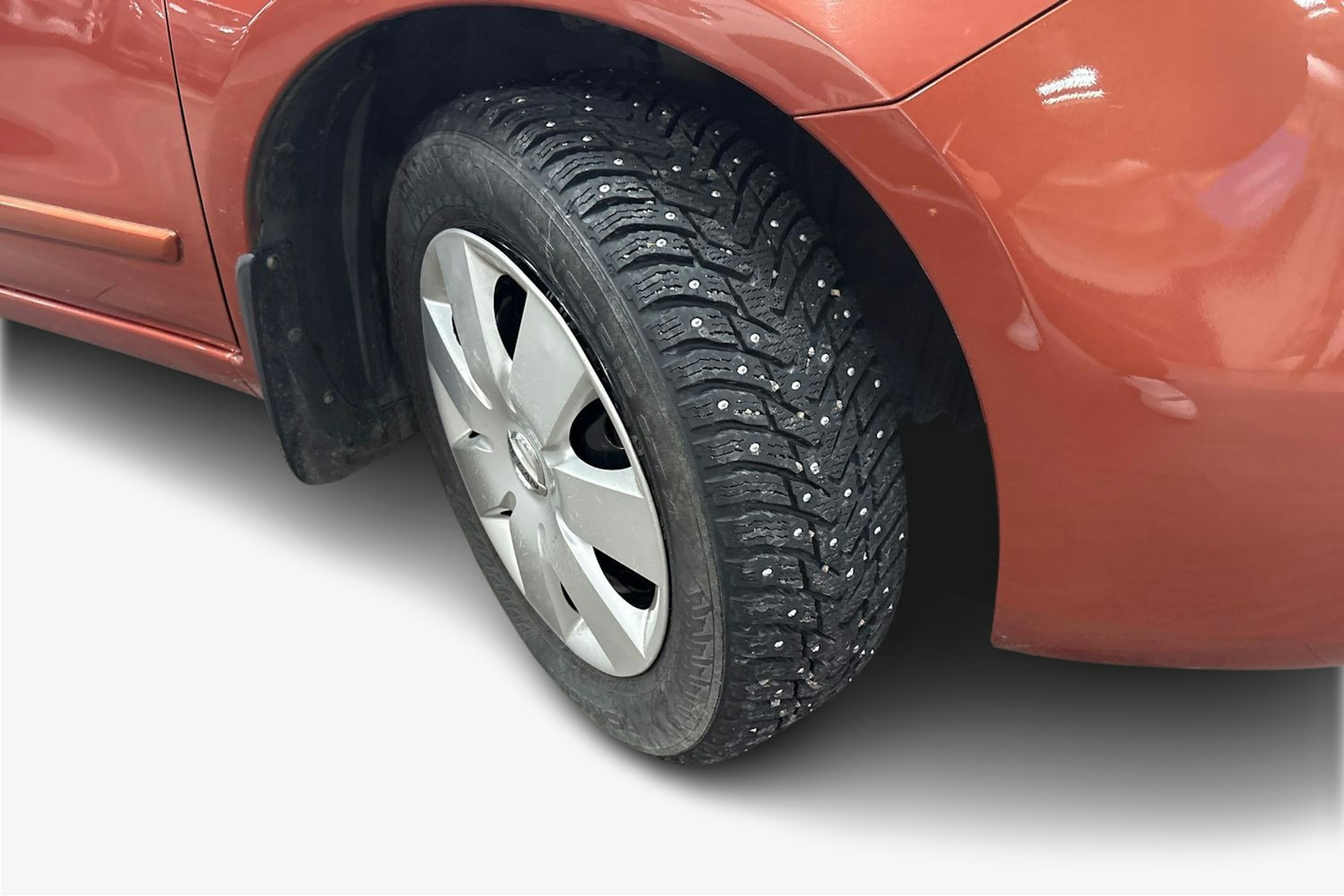 oranssi Nissan Note 2006 kuva 11.