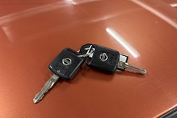 oranssi Nissan Note 2006 kuva 18.