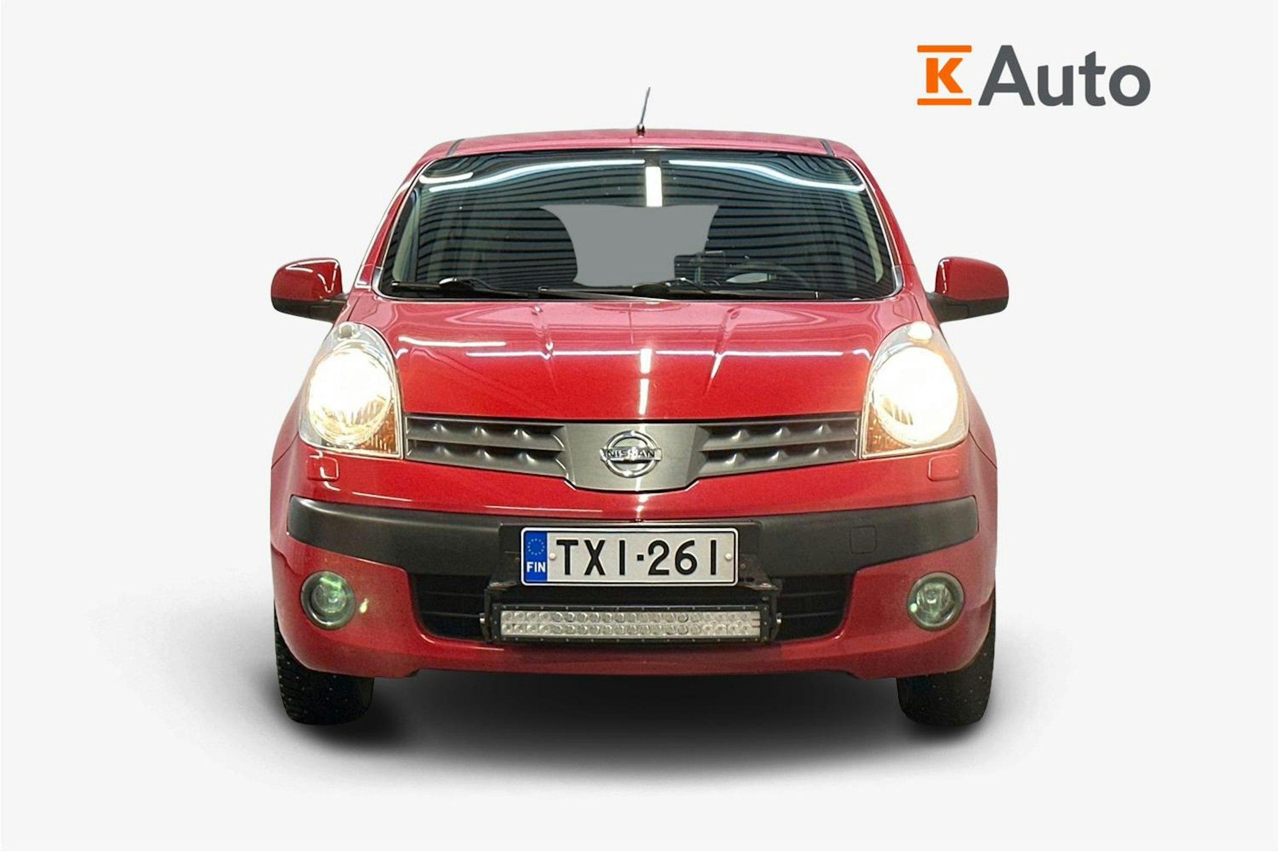 punainen Nissan Note 2007 kuva 5.