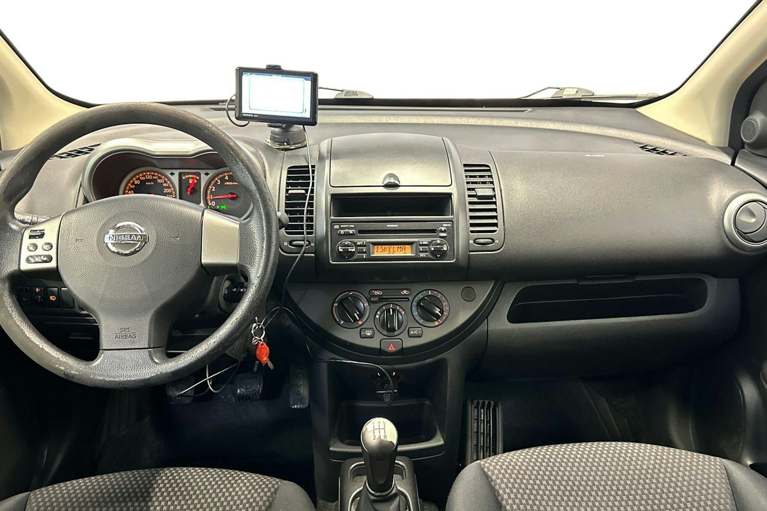 punainen Nissan Note 2007 kuva 9.