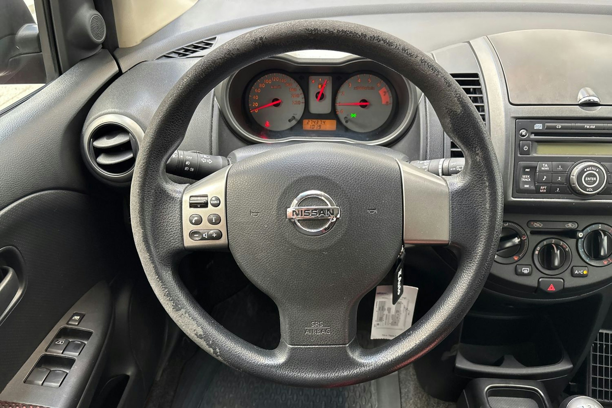 punainen Nissan Note 2008 kuva 19.