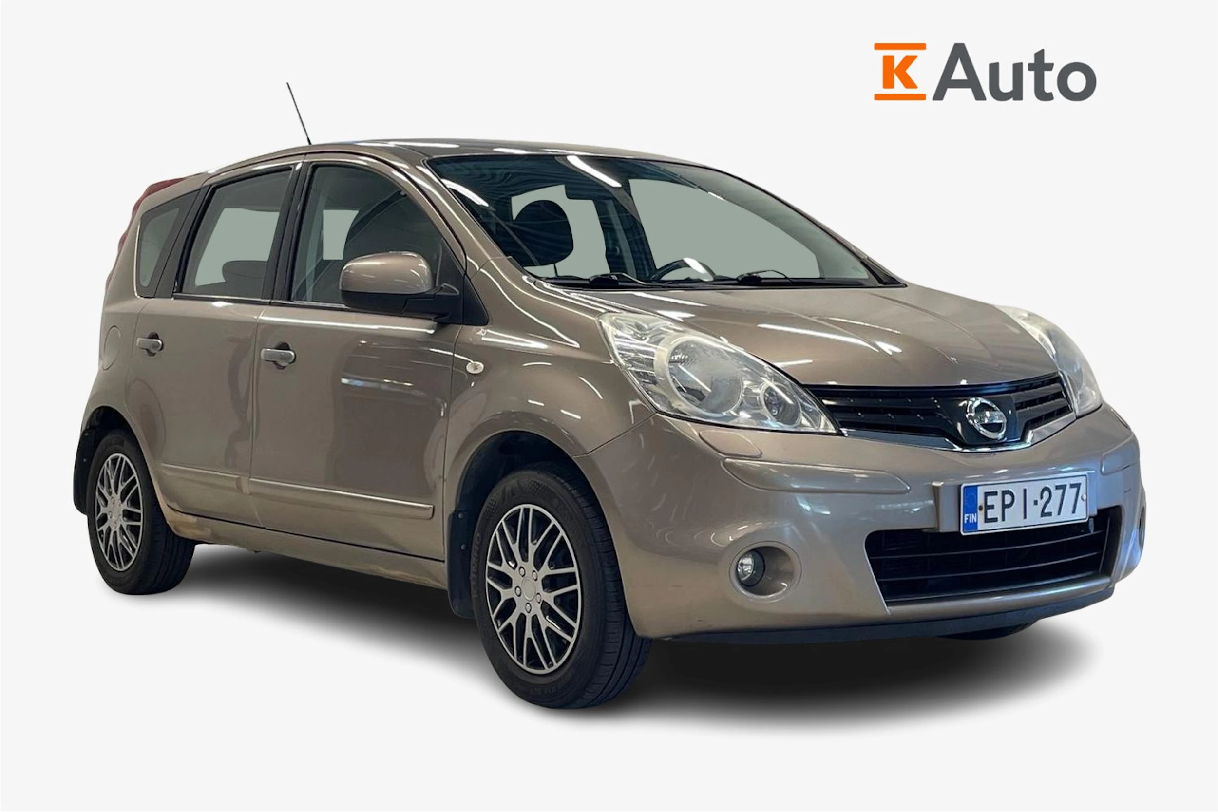 Ruskea (beige) Nissan Note 2011 kuva 1.