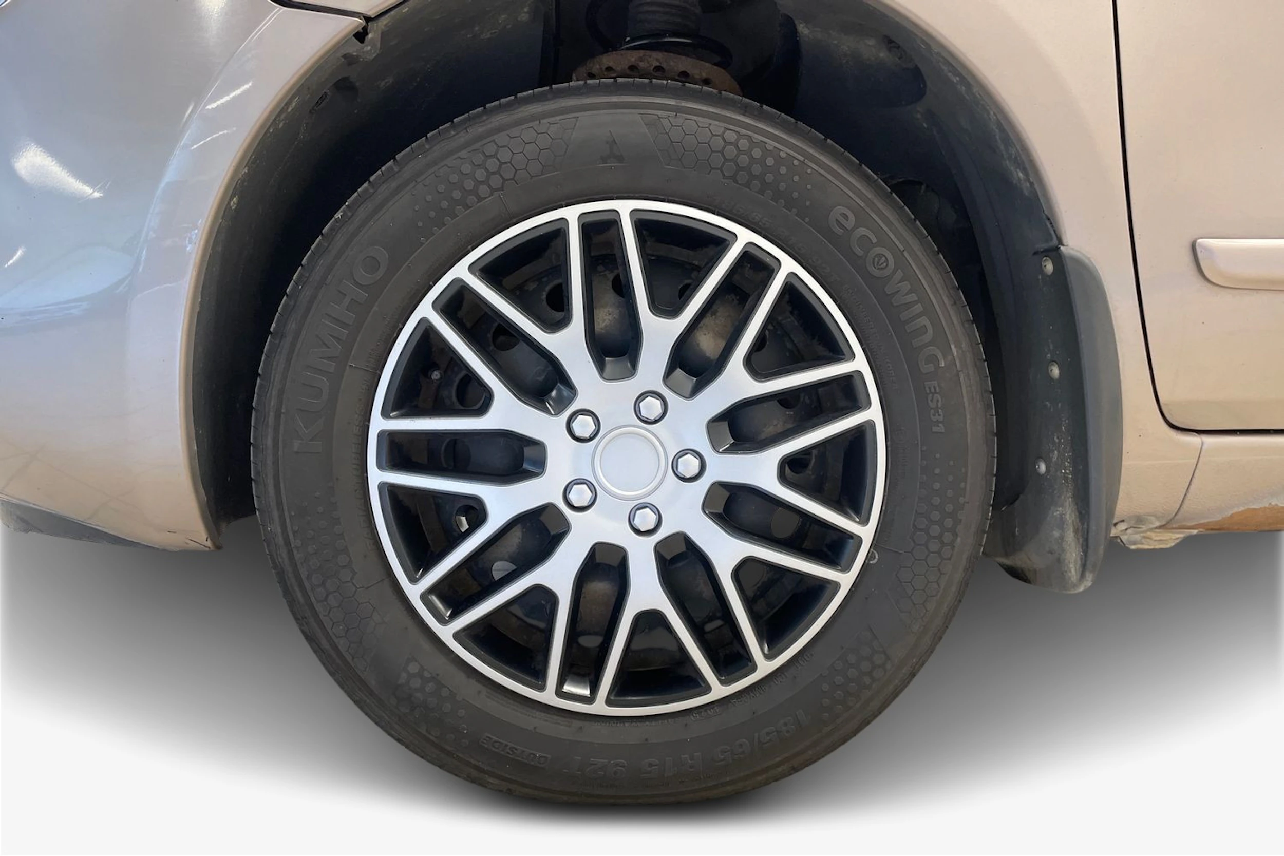 Ruskea (beige) Nissan Note 2011 kuva 9.